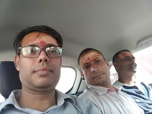 On the way back, Mukesh Dwivedi taking selfie while TN giving pose & Paras talking to Chandrabhall at the Back Seat of the Car.